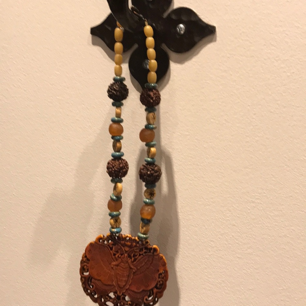Carved wooden necklace butterfly